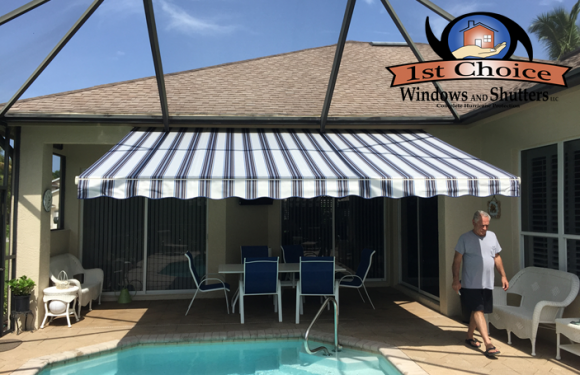 Open-retractable-awning-by-pool